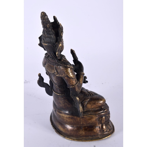 2049 - A 19TH CENTURY TIBETAN NEPALESE BRONZE FIGURE OF A SEATED BUDDHA modelled upon a triangular lotus ca... 