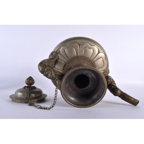 2050 - A LARGE 18TH/19TH CENTURY TIBETAN MIXED METAL BRONZE EWER decorated with dragon mask heads, the rim ... 