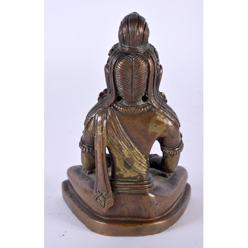 2051 - A GOOD 18TH CENTURY TIBETAN NEPALESE BRONZE FIGURE OF A SEATED BUDDHA modelled holding a stupa, upon... 