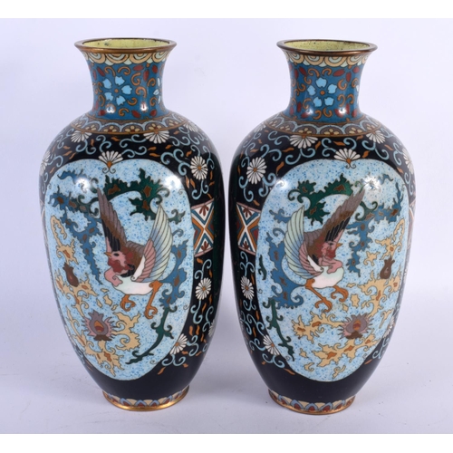 2057 - A PAIR OF 19TH CENTURY JAPANESE MEIJI PERIOD CLOISONNE ENAMEL VASES decorated with birds and foliage... 