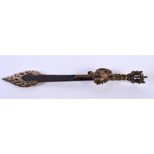 2058 - A RARE 19TH CENTURY TIBETAN FLAMING BUDDHISTIC MASK HEAD KNIFE possibly ceremonial, formed as a drag... 