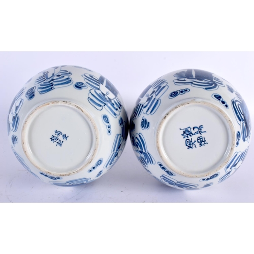 2061 - A PAIR OF CHINESE REPUBLICAN PERIOD BLUE AND WHITE PORCELAIN VASES decorated with figures amongst cl... 