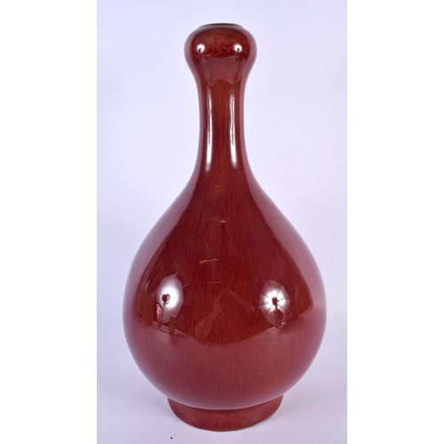 2071 - A LARGE CHINESE FLAMBE GLAZED GARLIC NECK SANG DU BOEUF VASE possibly Qing dynasty. 37 cm high.