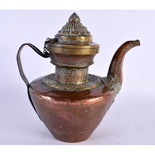 2083 - AN 18TH/19TH CENTURY NEPALESE TIBETAN MIXED METAL REPOUSSE COPPER EWER decorated with foliage and vi... 