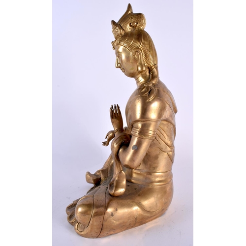 2093 - A LARGE EARLY 20TH CENTURY CHINESE GILT BRONZE FIGURE OF AN IMMORTAL Late Qing/Republic, modelled in... 