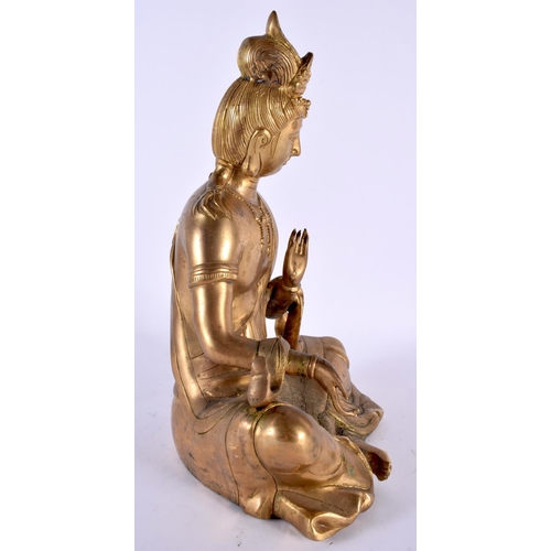 2093 - A LARGE EARLY 20TH CENTURY CHINESE GILT BRONZE FIGURE OF AN IMMORTAL Late Qing/Republic, modelled in... 