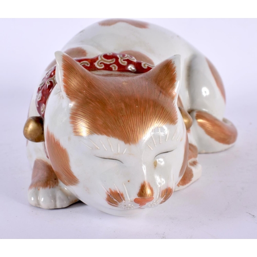 2107 - A 19TH CENTURY JAPANESE MEIJI PERIOD PORCELAIN CAT modelled sleeping. 21 cm wide.