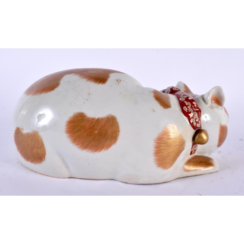 2107 - A 19TH CENTURY JAPANESE MEIJI PERIOD PORCELAIN CAT modelled sleeping. 21 cm wide.