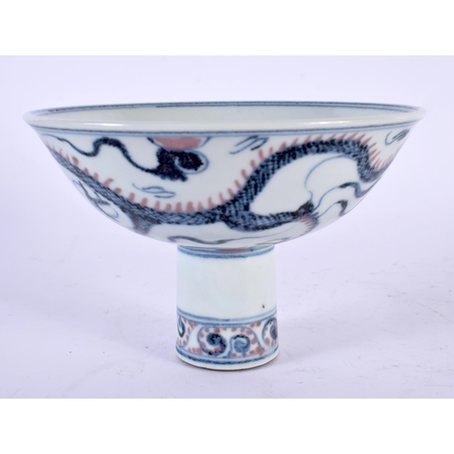 2108 - A CHINESE BLUE AND WHITE PORCELAIN DRAGON STEM CUP 20th Century. 14cm diameter.