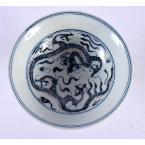 2108 - A CHINESE BLUE AND WHITE PORCELAIN DRAGON STEM CUP 20th Century. 14cm diameter.