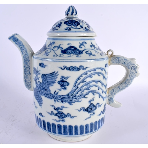 2114 - A CHINESE BLUE AND WHITE PORCELAIN TEAPOT AND COVER 20th Century. 22cm high.