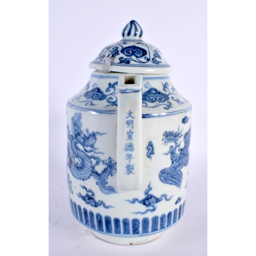 2114 - A CHINESE BLUE AND WHITE PORCELAIN TEAPOT AND COVER 20th Century. 22cm high.