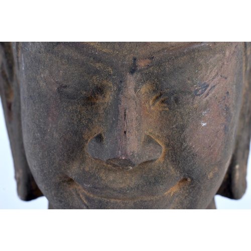 2118 - A SOUTH EAST ASIAN CAMBODIAN CARVED STONE BUST OF A MALE Khmer type, possibly 13th/14th century. 32 ... 