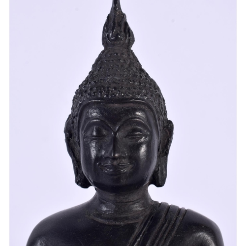 2122 - A SOUTH EAST ASIAN THAI BRONZE BUDDHA modelled upon a stepped base. 18cm x 12 cm.