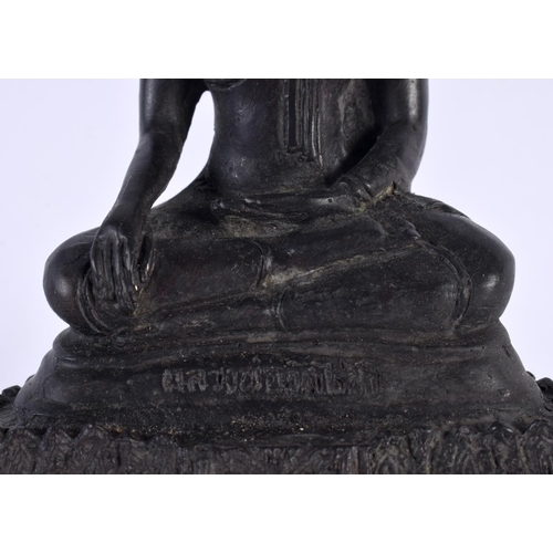 2122 - A SOUTH EAST ASIAN THAI BRONZE BUDDHA modelled upon a stepped base. 18cm x 12 cm.