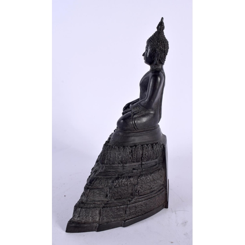 2122 - A SOUTH EAST ASIAN THAI BRONZE BUDDHA modelled upon a stepped base. 18cm x 12 cm.