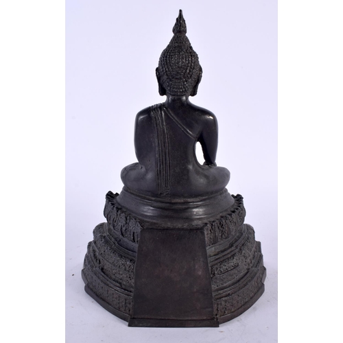 2122 - A SOUTH EAST ASIAN THAI BRONZE BUDDHA modelled upon a stepped base. 18cm x 12 cm.