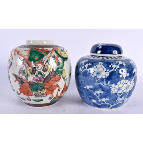 2130 - A 19TH CENTURY CHINESE BLUE AND WHITE GINGER JAR AND COVER Qing, together with a similar famille ver... 