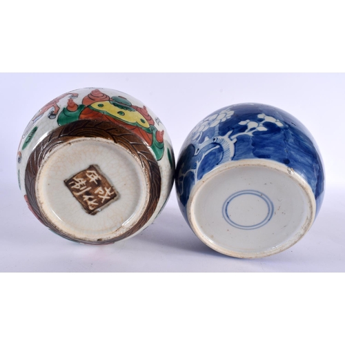 2130 - A 19TH CENTURY CHINESE BLUE AND WHITE GINGER JAR AND COVER Qing, together with a similar famille ver... 