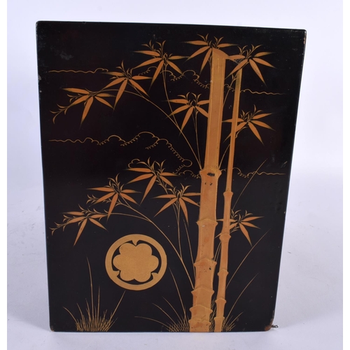 2133 - A 19TH CENTURY JAPANESE MEIJI PERIOD BLACK LACQUER KODANSU CABINET painted with bamboo and vines. 21... 