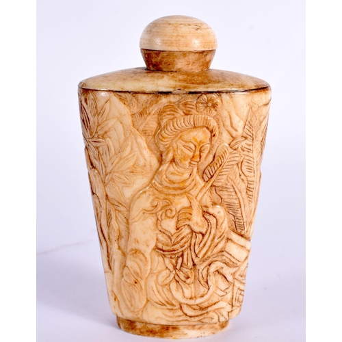 2137 - A 19TH CENTURY CHINESE CARVED BONE SNUFF BOTTLE AND STOPPER Qing, depicting figures within landscape... 