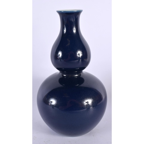 2144 - A CHINESE BLUE GROUND DOUBLE GOURD VASE 20th Century. 22cm high.