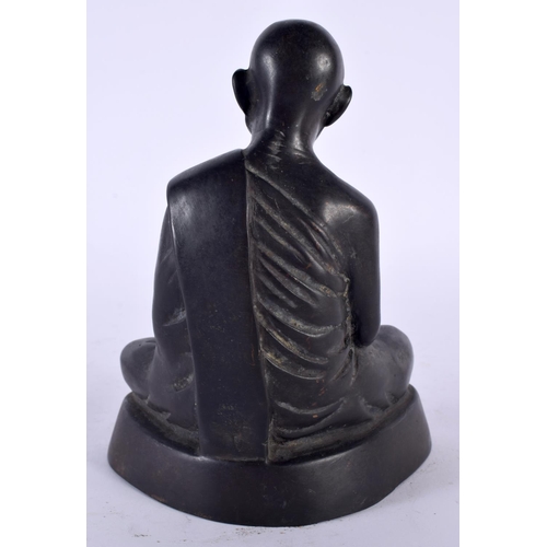 2153 - A CHINESE TIBETAN BRONZE FIGURE OF AN ELDERLY BUDDHA 20th Century. 16 cm high.