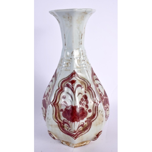 2160 - A CHINESE IRON RED PORCELAIN FACETED VASE 20th Century. 24 cm high.