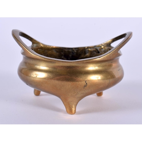 2166 - A MINIATURE 19TH CENTURY CHINESE TWIN HANDLED BRONZE CENSER bearing Xuande marks to base. 102 grams.... 