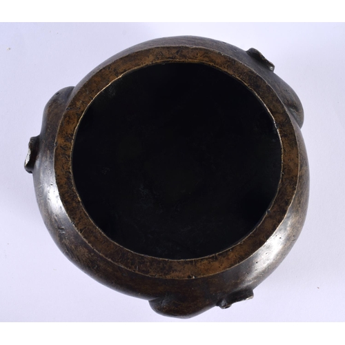 2167 - A VERY RARE 18TH/19TH CENTURY CHINESE BRONZE CENSER bearing Xuande marks to base, formed with three ... 