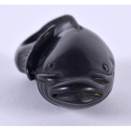 2168 - A 19TH CENTURY JAPANESE MEIJI PERIOD CARVED WOOD NETSUKE formed as a catfish. 5.5 cm x 3 cm.