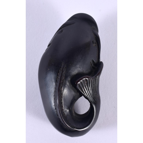 2168 - A 19TH CENTURY JAPANESE MEIJI PERIOD CARVED WOOD NETSUKE formed as a catfish. 5.5 cm x 3 cm.