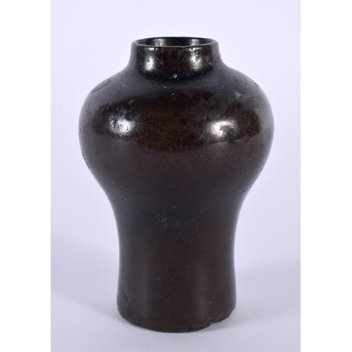 2169 - A SMALL 17TH/18TH CENTURY CHINESE BRONZE BALUSTER VASE Ming/Qing. 9 cm x 5 cm.