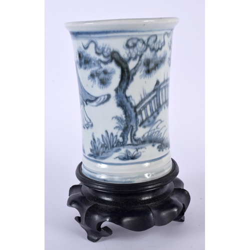 2172 - A CHINESE QING DYNASTY BLUE AND WHITE PORCELAIN BRUSH POT painted with immortals within landscapes. ... 