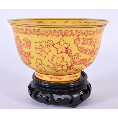 2173 - AN EARLY 20TH CENTURY CHINESE YELLOW GROUND PORCELAIN BOWL Late Qing/Republic, painted with dragons ... 