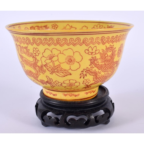 2173 - AN EARLY 20TH CENTURY CHINESE YELLOW GROUND PORCELAIN BOWL Late Qing/Republic, painted with dragons ... 