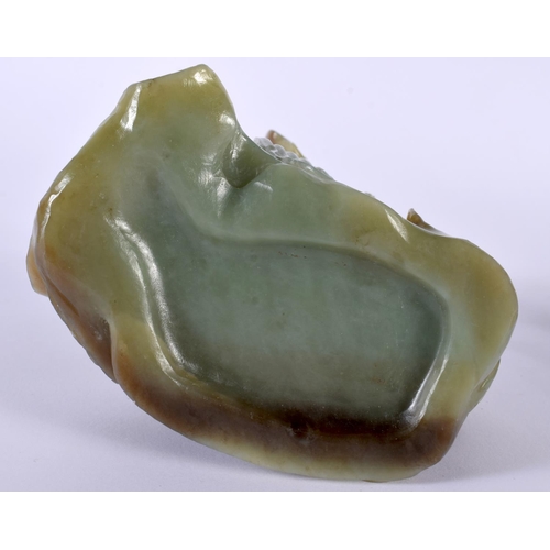 2174 - AN EARLY 20TH CENTURY CHINESE CARVED GREEN JADE FIGURAL GROUP Late Qing/Republic, modelled as a slee... 