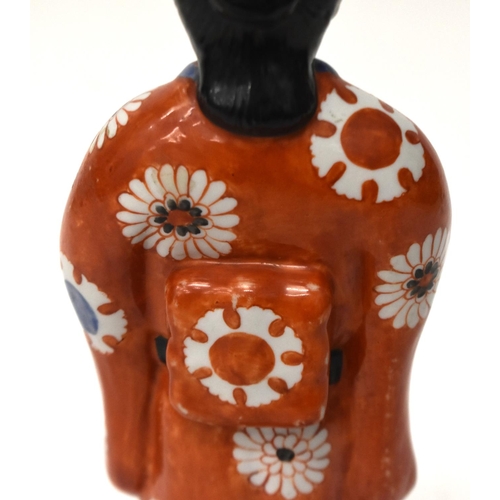 2182 - A LARGE 19TH CENTURY JAPANESE MEIJI PERIOD PORCELAIN FIGURE OF A FEMALE modelled holding a twin hand... 