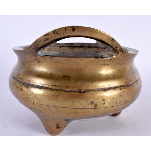 2183 - A 19TH CENTURY CHINESE TWIN HANDLED BRONZE CENSER bearing Xuande marks to base. 1210 grams. 15cm wid... 