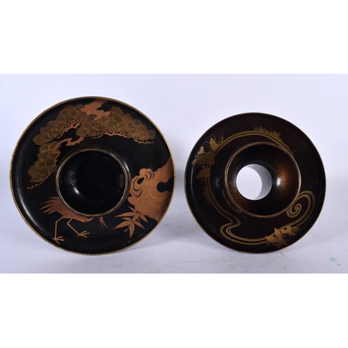 2186 - TWO FINE 19TH CENTURY JAPANESE MEIJI PERIOD BLACK AND GOLD LACQUER TEABOWL STANDS decorated with fol... 