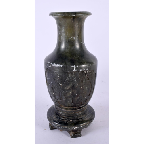 2194 - AN UNUSUAL 19TH CENTURY CHINESE CARVED SOAPSTONE VASE decorated scholars and animals. 19 cm high.