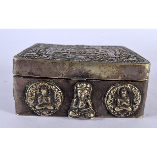 2210 - AN EARLY 20TH CENTURY INDO TIBETAN WHITE METAL SQUARE FORM TRAVELLING BOX overlaid with buddhistic f... 