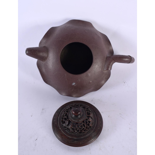 2217 - TWO EARLY 20TH CENTURY CHINESE YIXING POTTERY TEAPOTS AND COVERS Late Qing/Republic, together with a... 