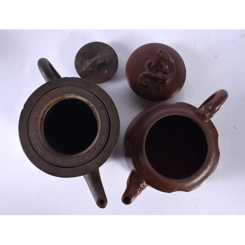 2217 - TWO EARLY 20TH CENTURY CHINESE YIXING POTTERY TEAPOTS AND COVERS Late Qing/Republic, together with a... 