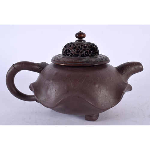 2217 - TWO EARLY 20TH CENTURY CHINESE YIXING POTTERY TEAPOTS AND COVERS Late Qing/Republic, together with a... 