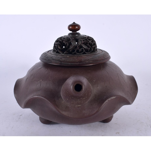 2217 - TWO EARLY 20TH CENTURY CHINESE YIXING POTTERY TEAPOTS AND COVERS Late Qing/Republic, together with a... 