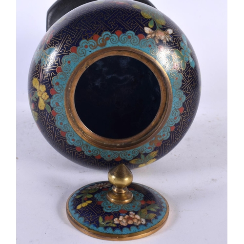 2219 - A 19TH CENTURY CHINESE CLOISONNE ENAMEL BULBOUS VASE AND COVER Qing, decorated with foliage upon a d... 