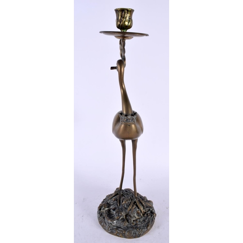 2221 - A LARGE 19TH CENTURY JAPANESE MEIJI PERIOD BRONZE CANDLESTICK formed as a standing bird holding alof... 