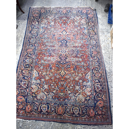 3802 - An Oriental rug 199 x 125 cm.