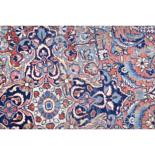 3802 - An Oriental rug 199 x 125 cm.